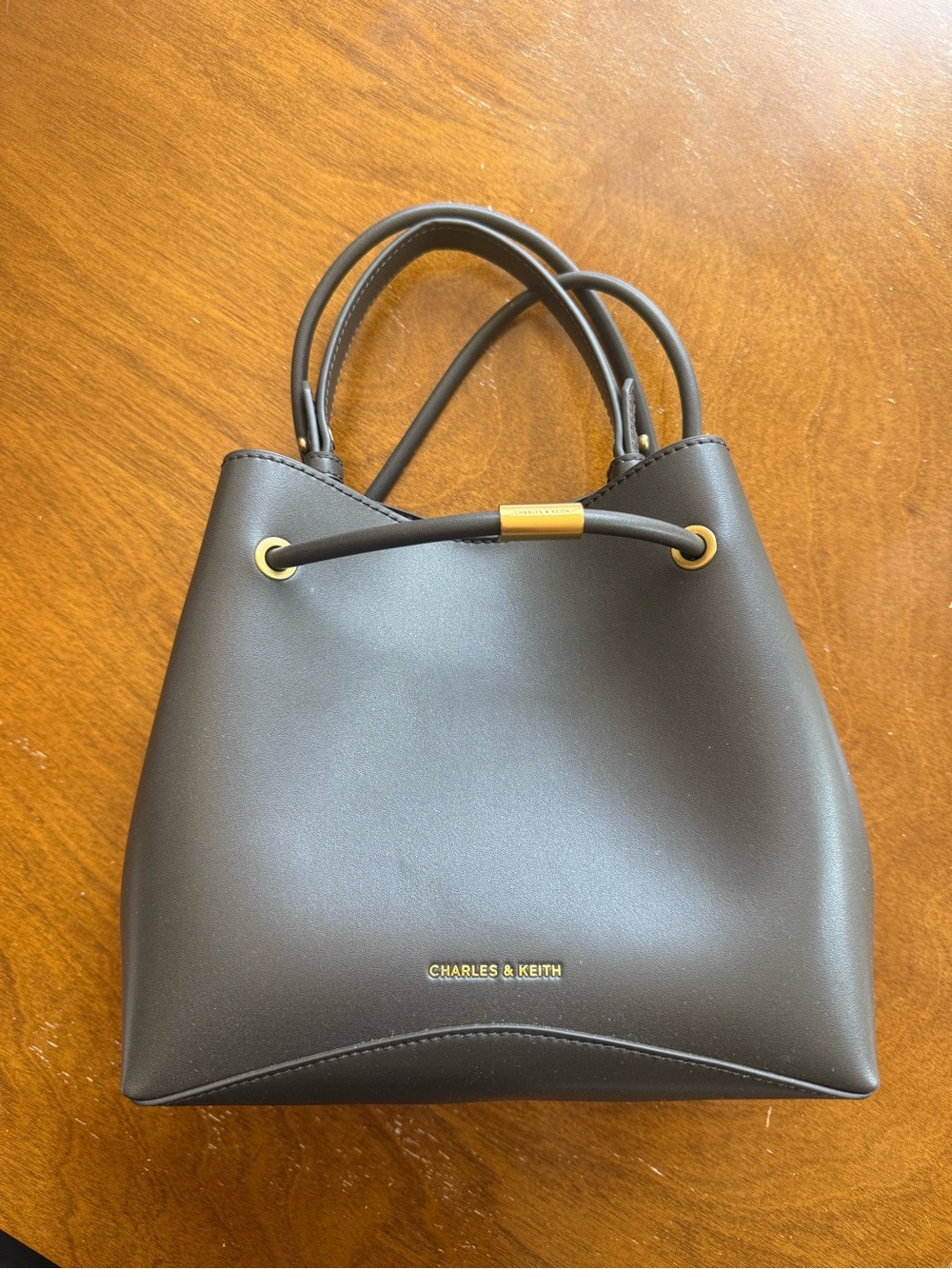 Charles & Keith dark green handbag with adjustable shoulder strap